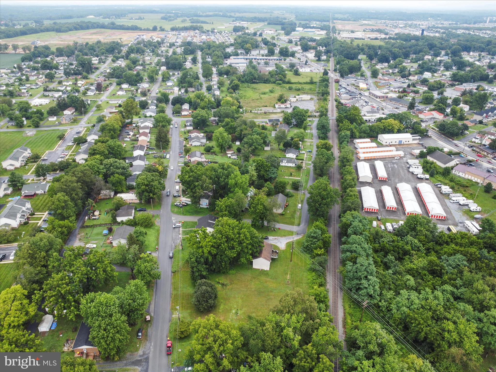 406 Burns Street Ranson, WV 25438 - Photo 14 of 32 an aerial view of residential houses with outdoor space and trees