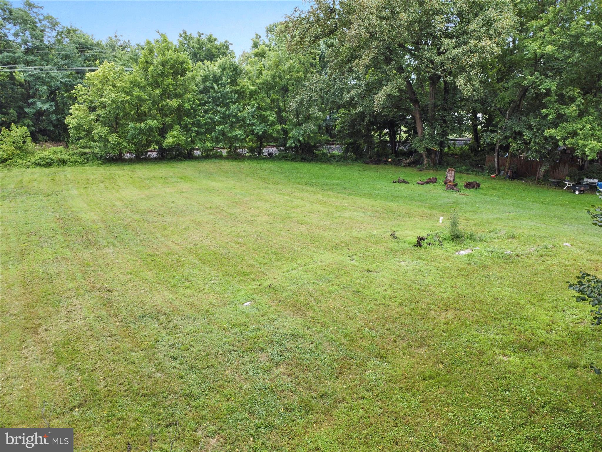 406 Burns Street Ranson, WV 25438 - Photo 19 of 32 a view of a field with trees in the background