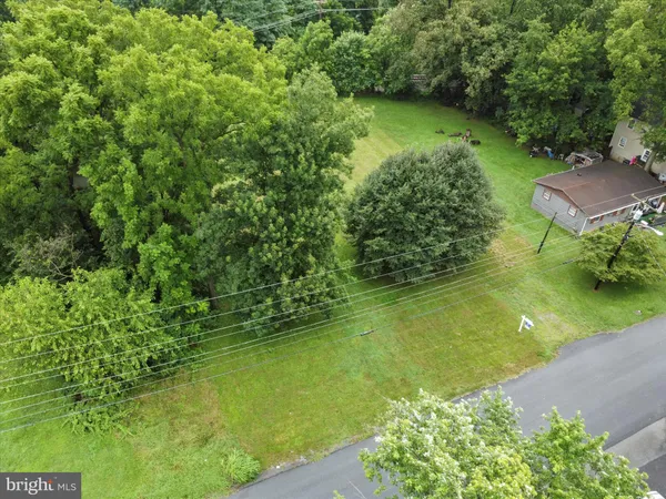 a view of a lake with a yard