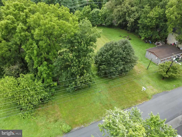 a view of a lake with a yard