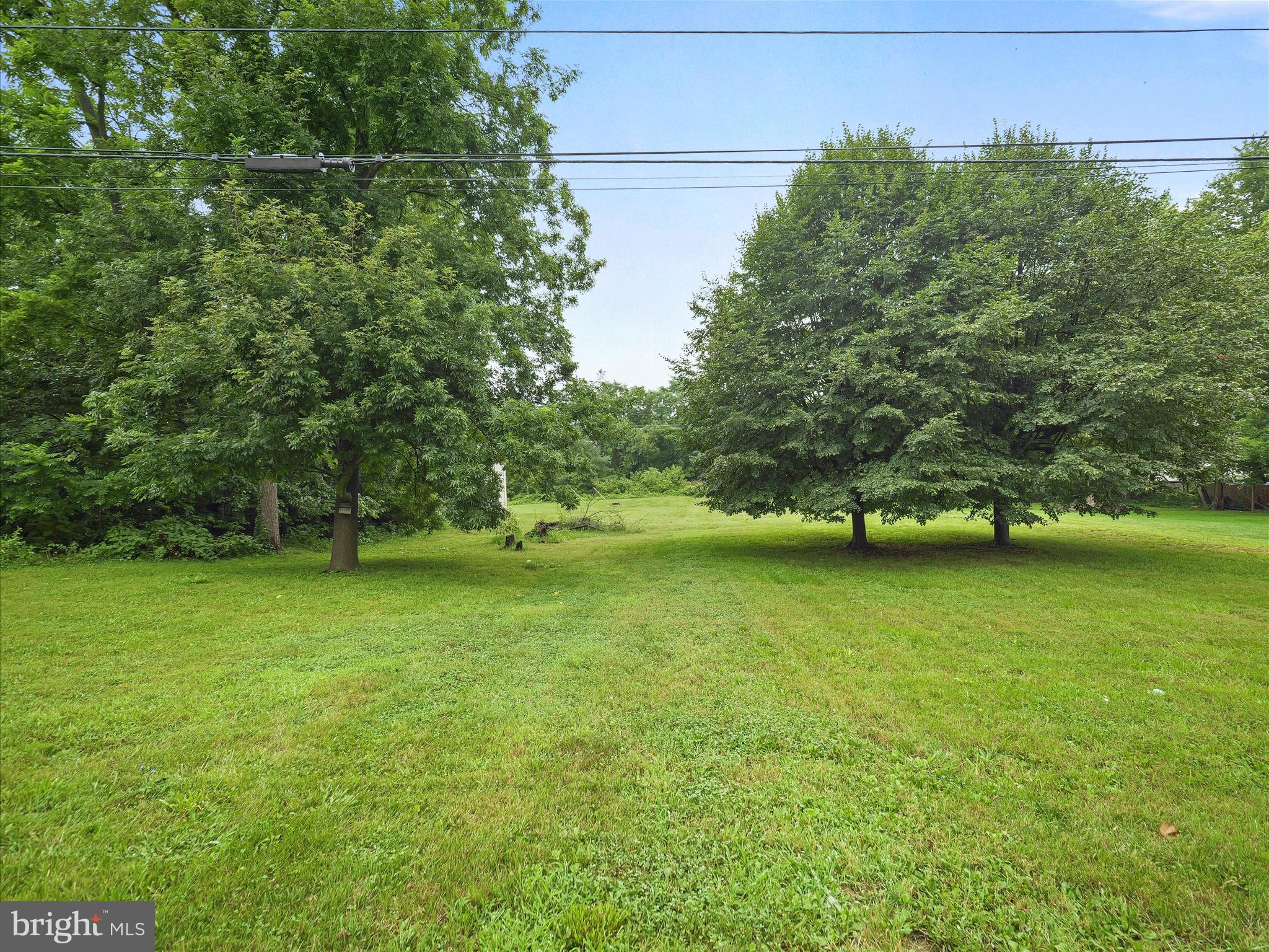 406 Burns Street Ranson, WV 25438 - Photo 26 of 32 a view of a field of grass and trees