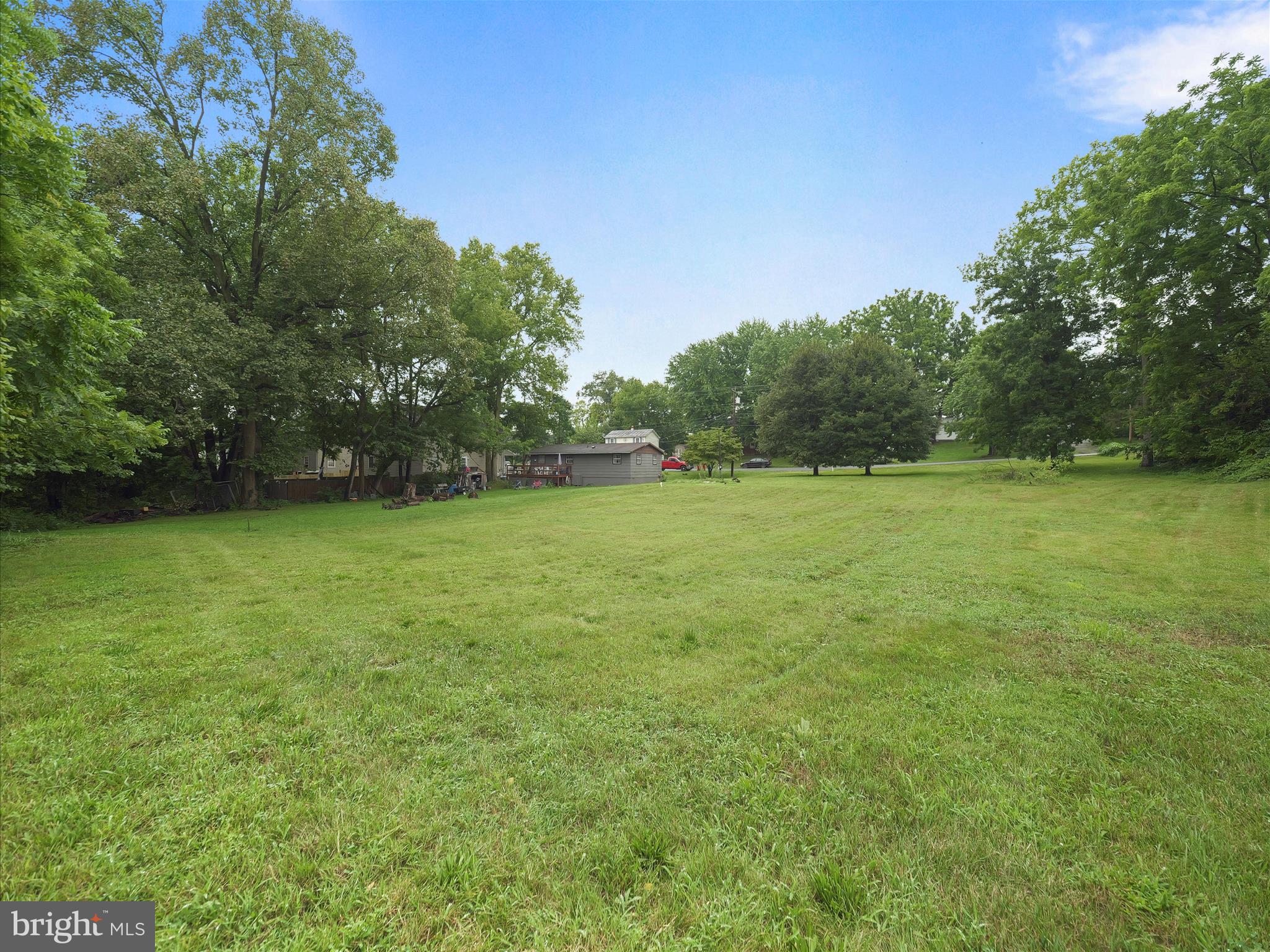 406 Burns Street Ranson, WV 25438 - Photo 30 of 32 a view of a field of grass and trees