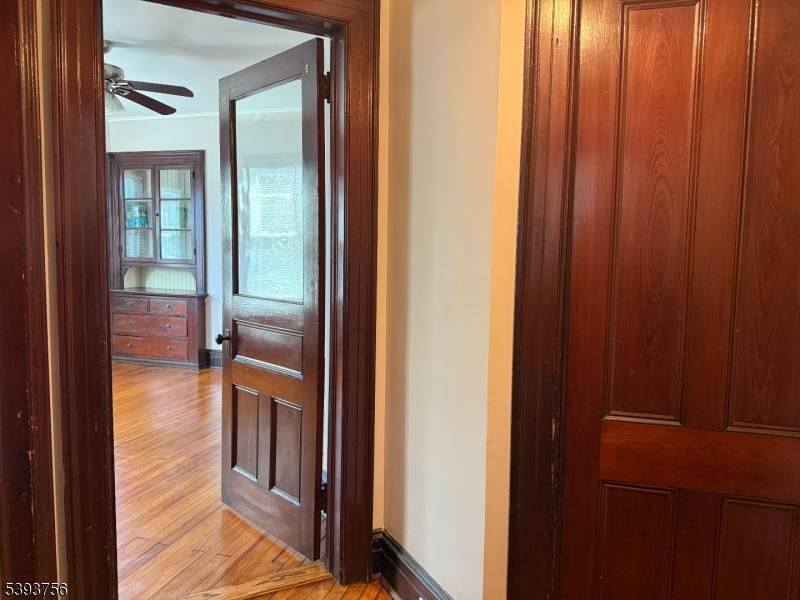 32 Montclair Avenue, Unit 1 Montclair, NJ 07042 - Photo 2 of 14 a view of a hallway and a livingroom with furniture