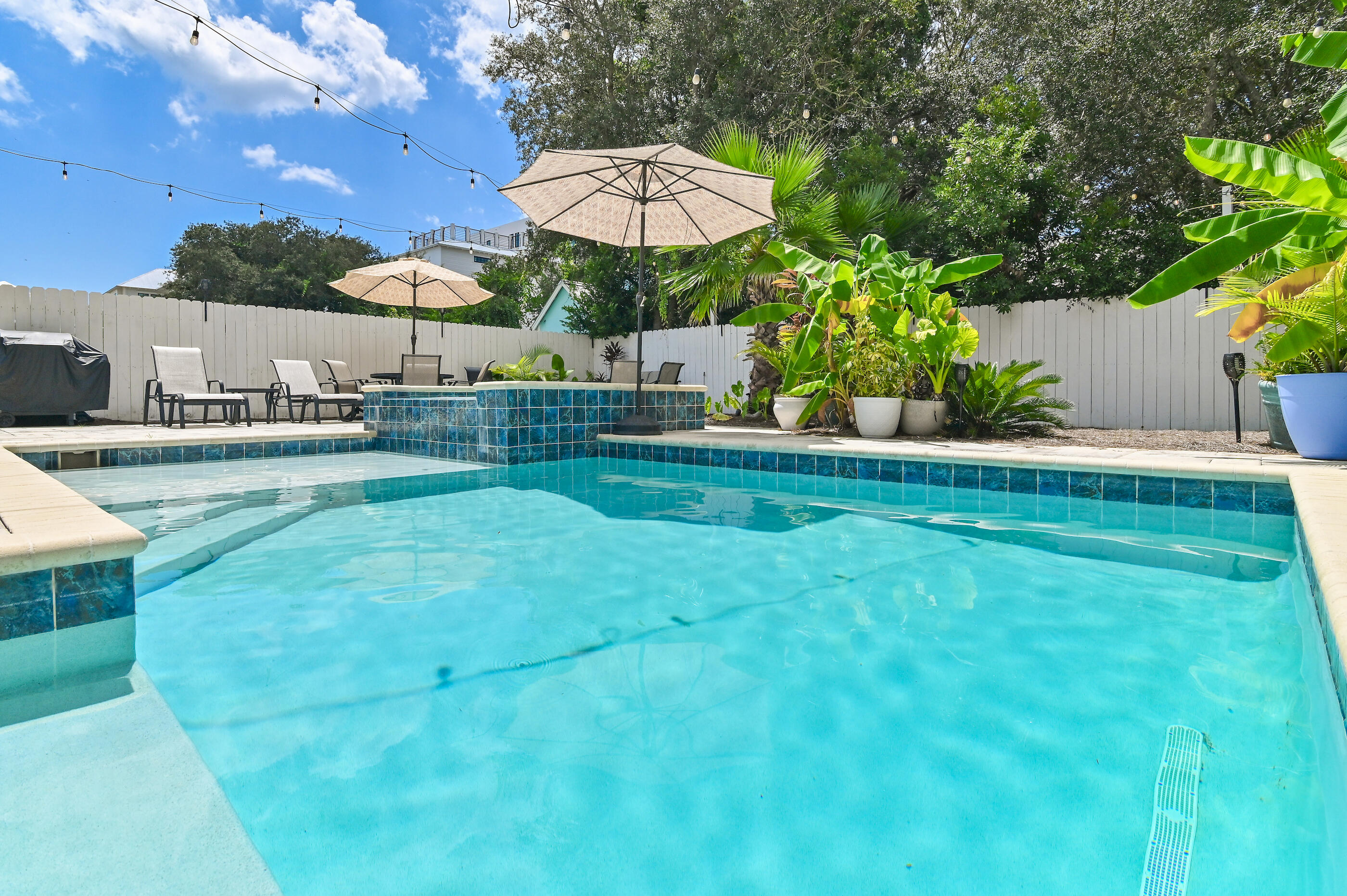 75 Pelayo Avenue Santa Rosa Beach, FL 32459 - Photo 12 of 67 a view of a house with a yard and sitting area