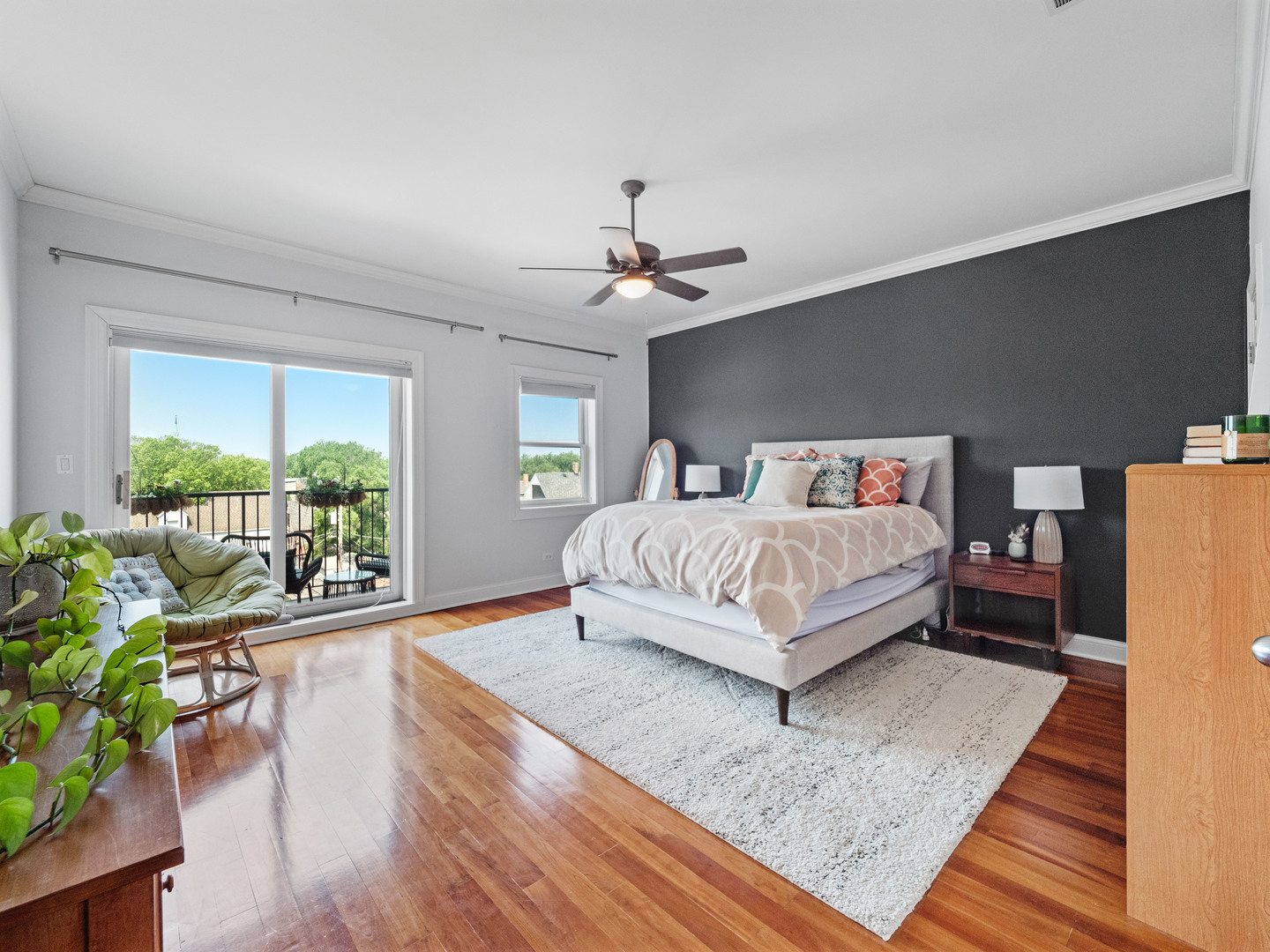 2940 North Sheffield Avenue, Unit 4N Chicago, IL 60657 - Photo 12 of 32 a bedroom with a bed furniture and a large window