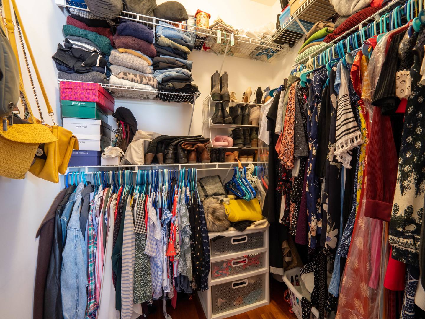 2940 North Sheffield Avenue, Unit 4N Chicago, IL 60657 - Photo 19 of 32 a view of walk in closet with clothes and shoes