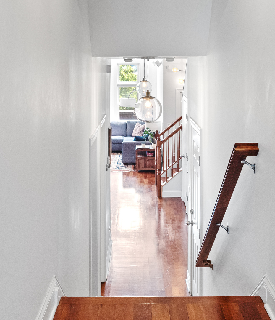 2940 North Sheffield Avenue, Unit 4N Chicago, IL 60657 - Photo 20 of 32 a view of entryway and hall with wooden floor