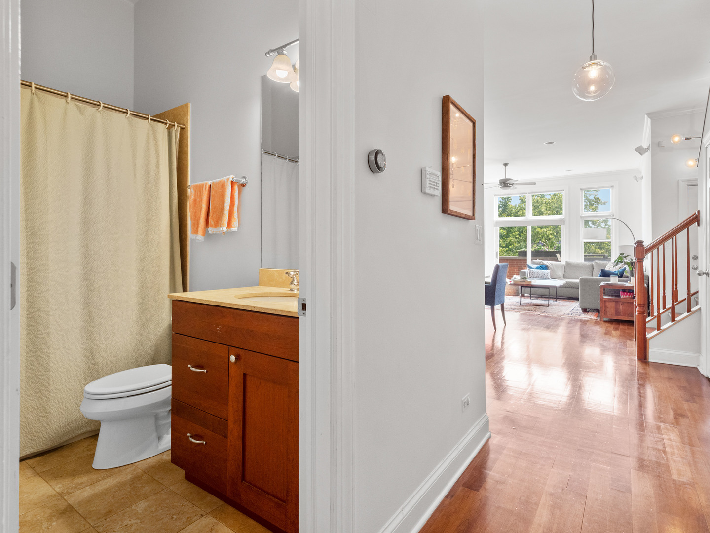 2940 North Sheffield Avenue, Unit 4N Chicago, IL 60657 - Photo 22 of 32 a bathroom with a sink toilet and shower