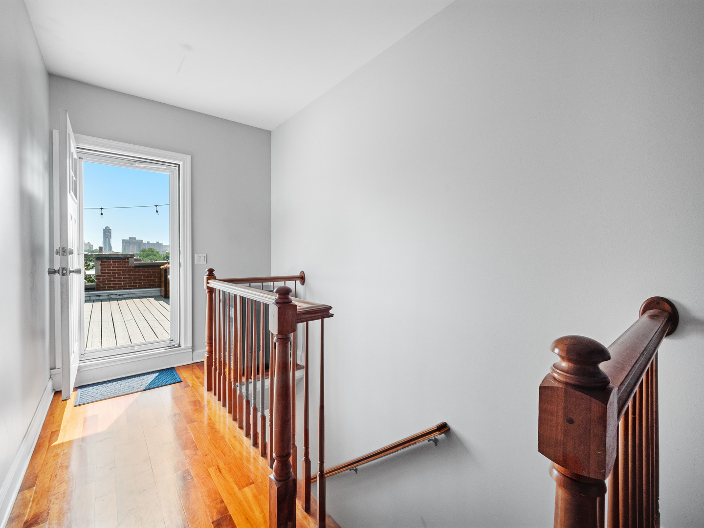 2940 North Sheffield Avenue, Unit 4N Chicago, IL 60657 - Photo 24 of 32 a view of a hallway with windows