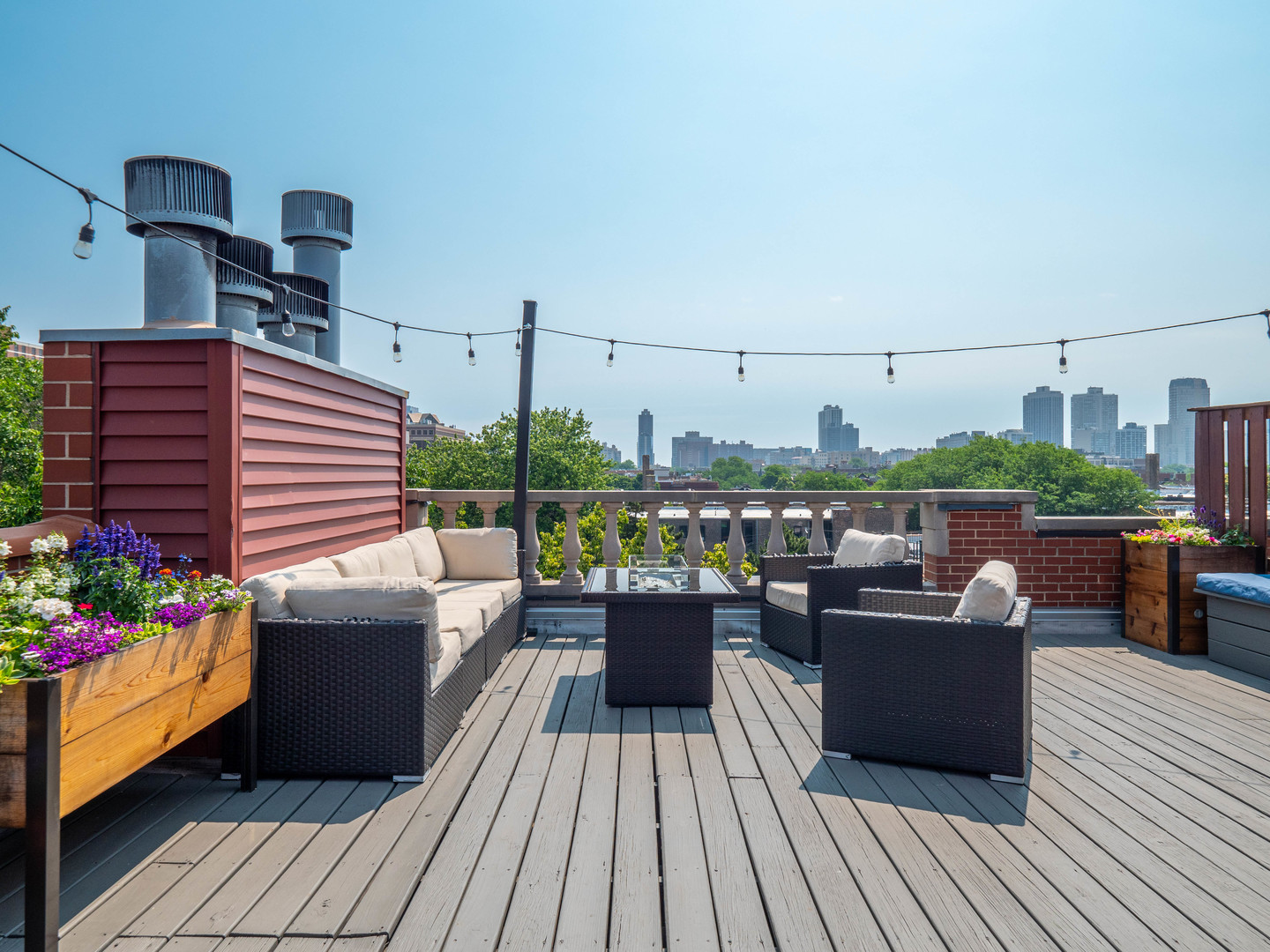 2940 North Sheffield Avenue, Unit 4N Chicago, IL 60657 - Photo 27 of 32 a view of a roof deck with couches