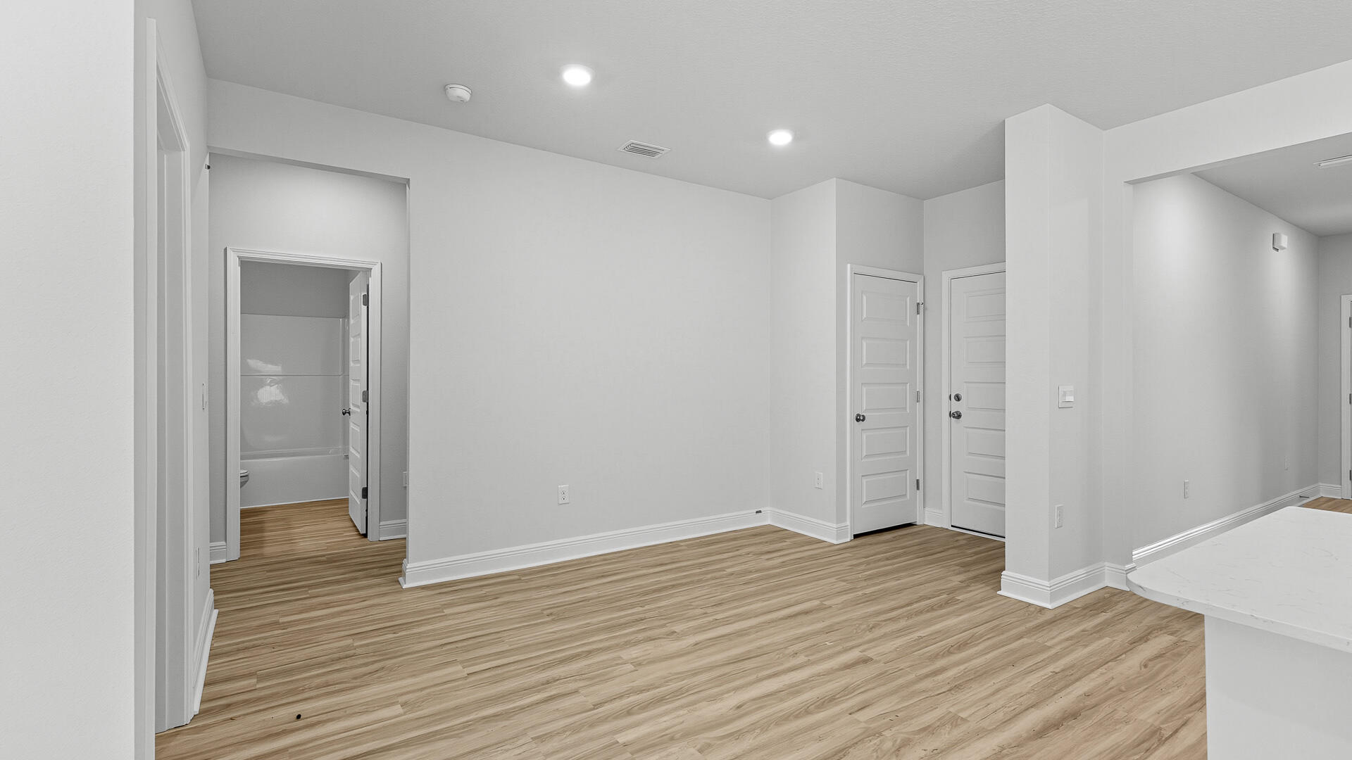 4607 Soldier Court Crestview, FL 32539 - Photo 18 of 36 a view of hallway with wooden floor