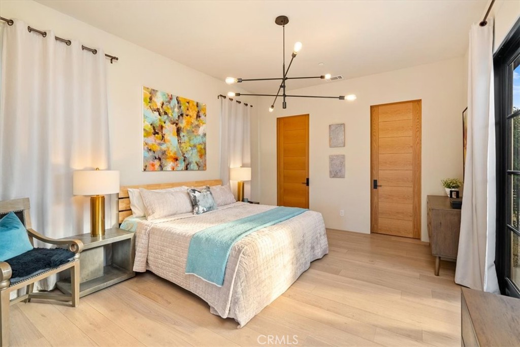 3940 Gruenhagen Flat Road Paso Robles, CA 93446 - Photo 19 of 63 a bedroom with a bed dresser and a window