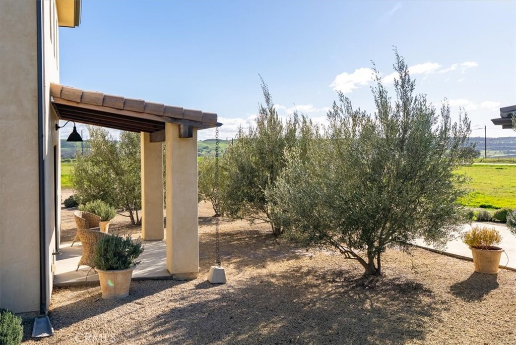 3940 Gruenhagen Flat Road Paso Robles, CA 93446 - Photo 31 of 63 a view of a porch with a tree