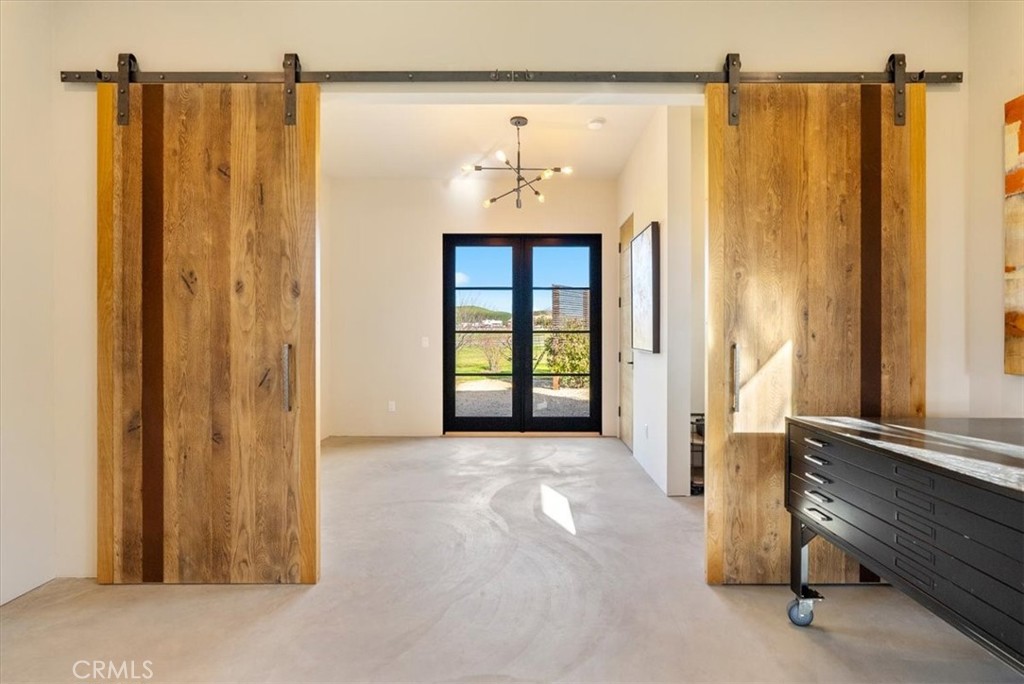 3940 Gruenhagen Flat Road Paso Robles, CA 93446 - Photo 35 of 63 a view of a hallway with windows and entryway
