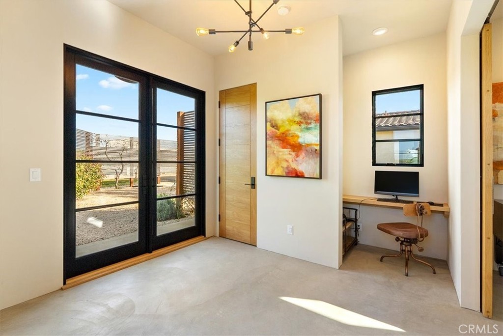 3940 Gruenhagen Flat Road Paso Robles, CA 93446 - Photo 36 of 63 a view of a livingroom with workspace and a window
