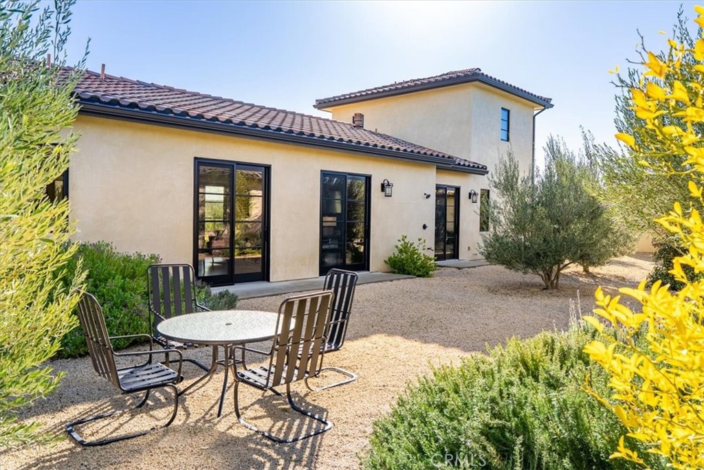 3940 Gruenhagen Flat Road Paso Robles, CA 93446 - Photo 43 of 63 a view of a house with backyard and sitting area