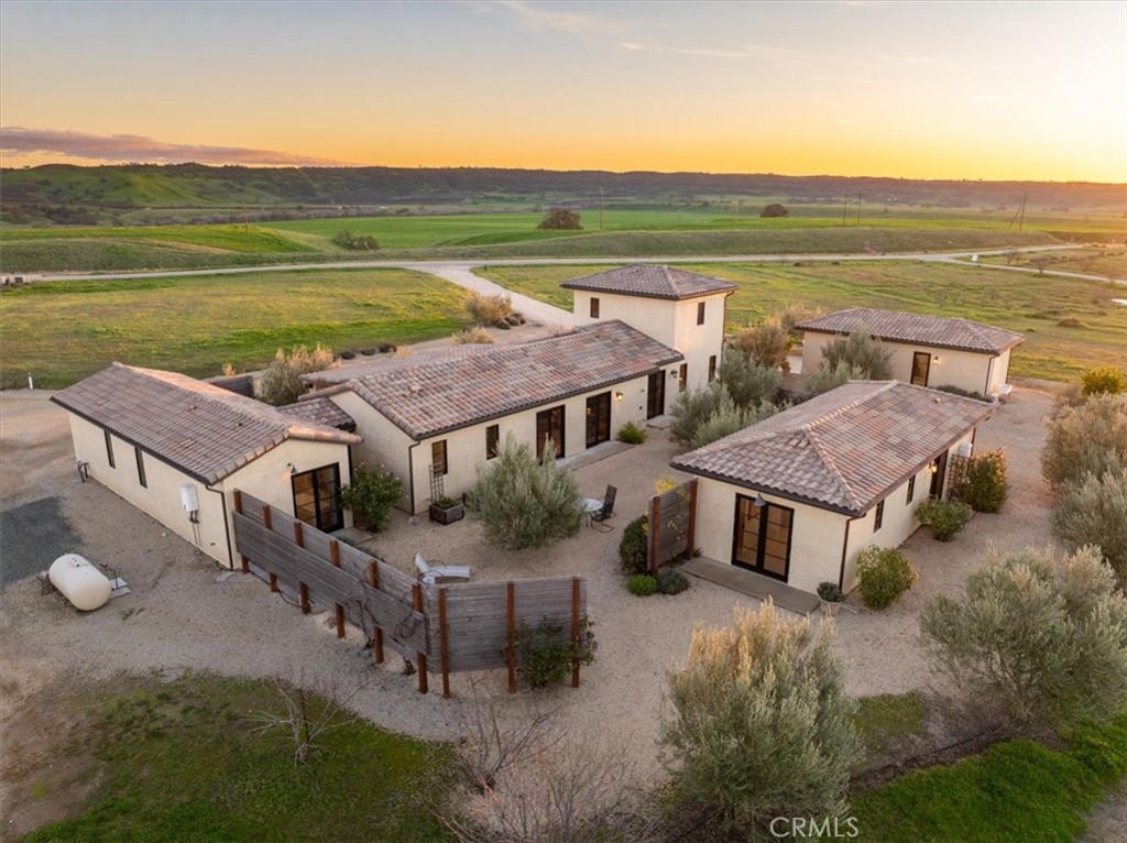 3940 Gruenhagen Flat Road Paso Robles, CA 93446 - Photo 57 of 63 an aerial view of a house with a yard and lake view
