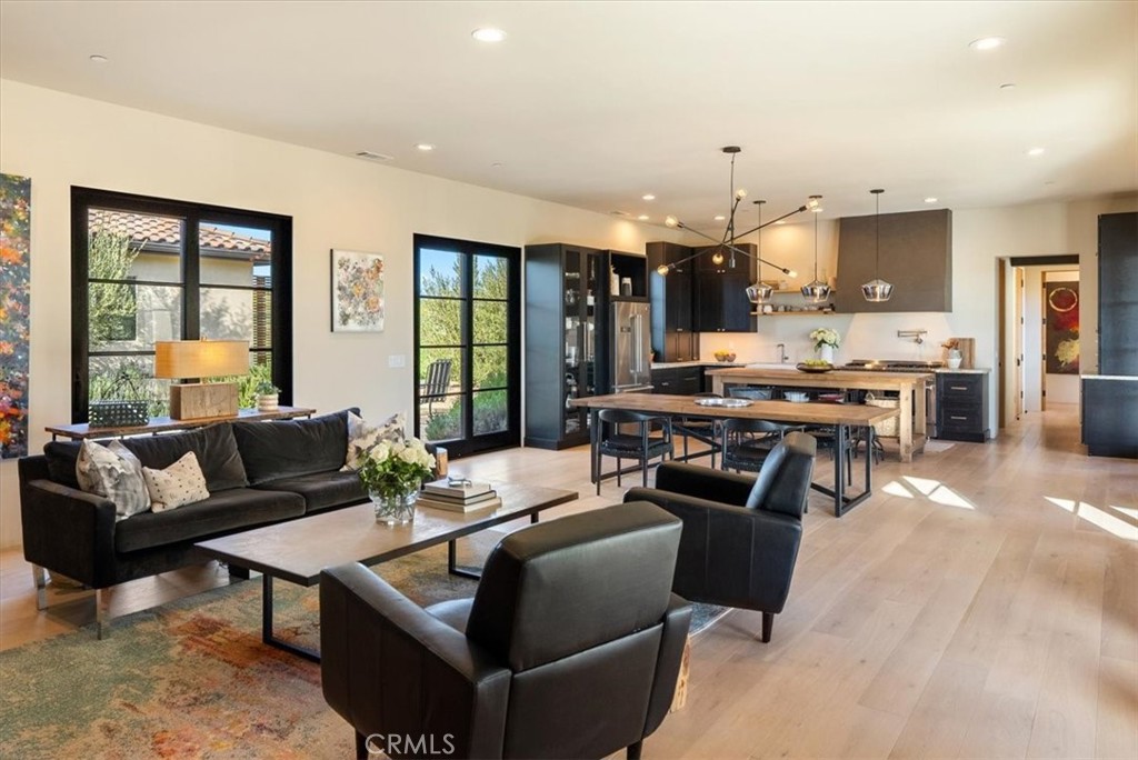 3940 Gruenhagen Flat Road Paso Robles, CA 93446 - Photo 6 of 63 a living room with furniture kitchen view and large windows