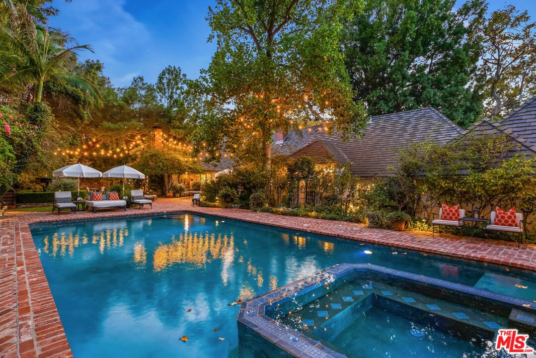 3240 Fryman Road Studio City, CA 91604 - Photo 3 of 11 a view of a lake with a house in the background