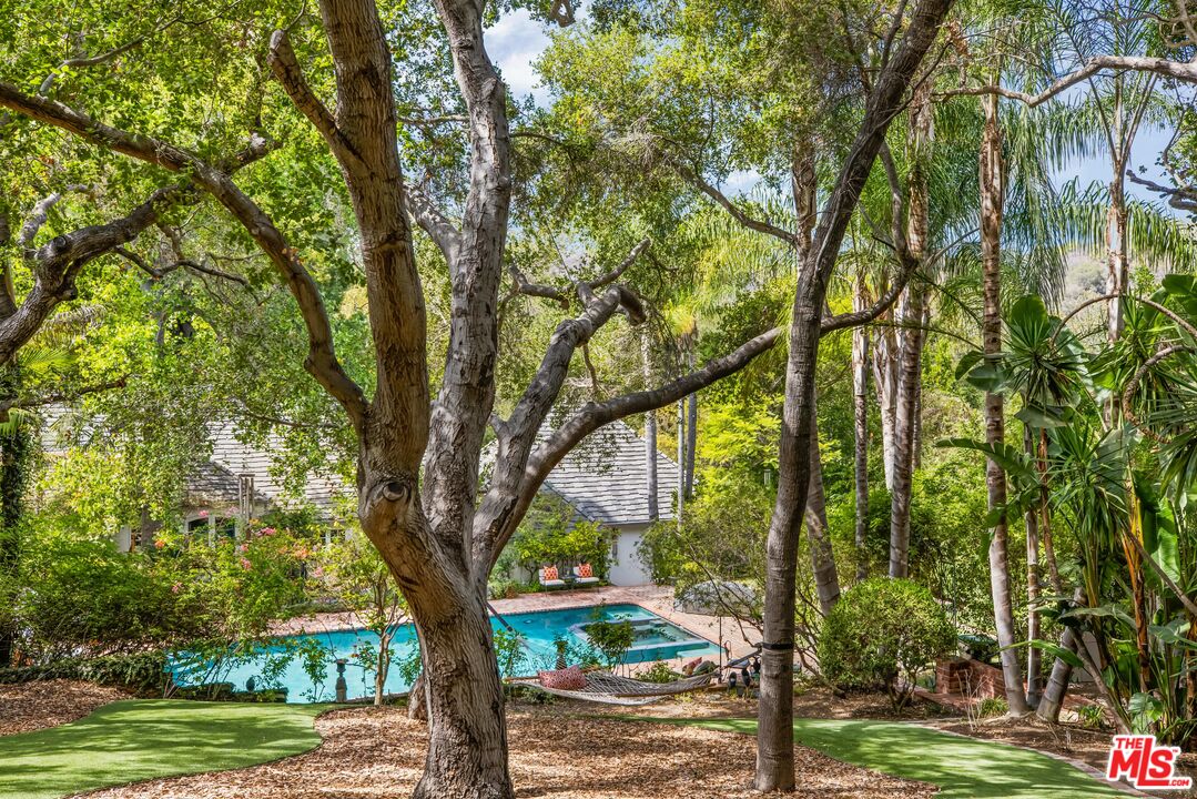 3240 Fryman Road Studio City, CA 91604 - Photo 6 of 11 a view of outdoor space with deck and tree