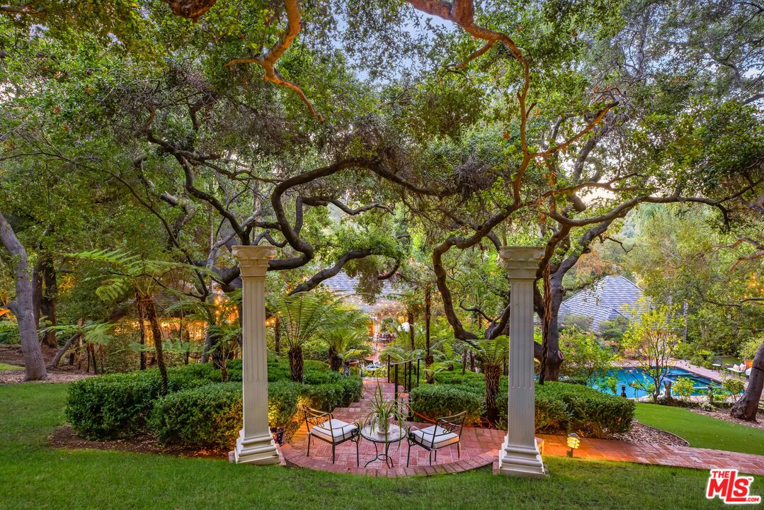 3240 Fryman Road Studio City, CA 91604 - Photo 10 of 11 a view of a backyard with a large tree