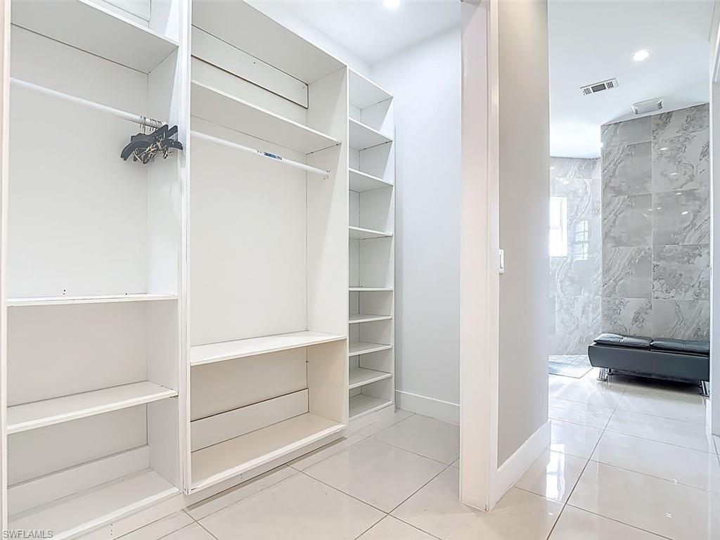 1806 41st Street Southwest Naples, FL 34116 - Photo 14 of 27 a view of walk in closet