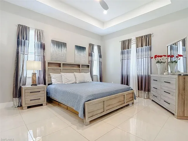 a bedroom with a bed and a cabinets