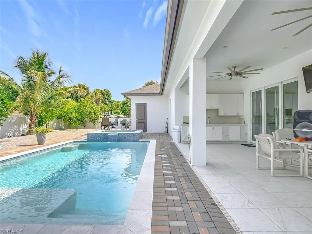 1806 41st Street Southwest Naples, FL 34116 - Photo 5 of 27 a view of a house with a porch