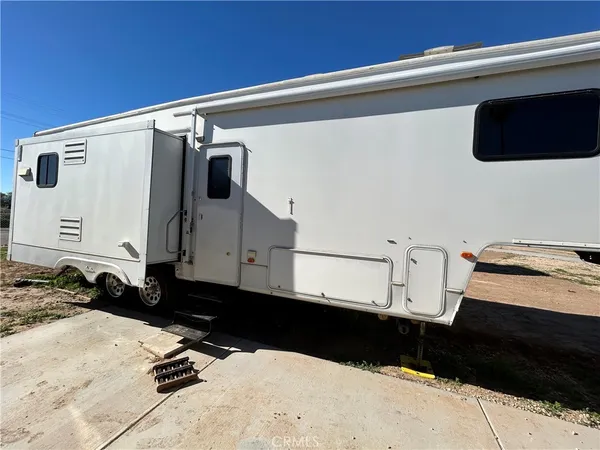 a view of a back yard of the house