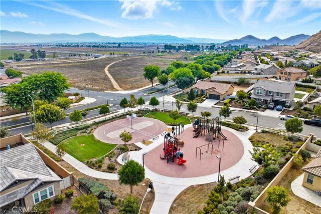 an aerial view of a house with outdoor space