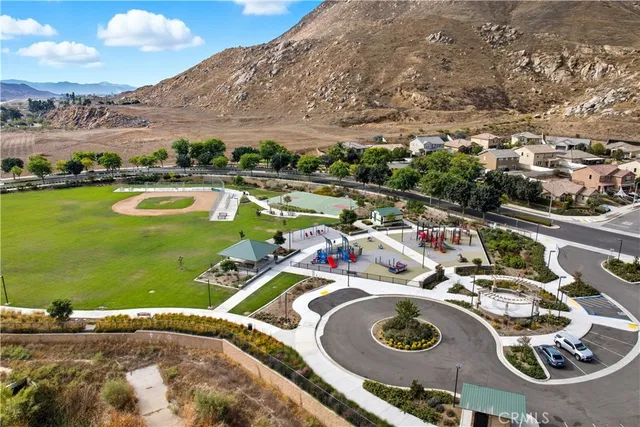 an aerial view of a house with a garden