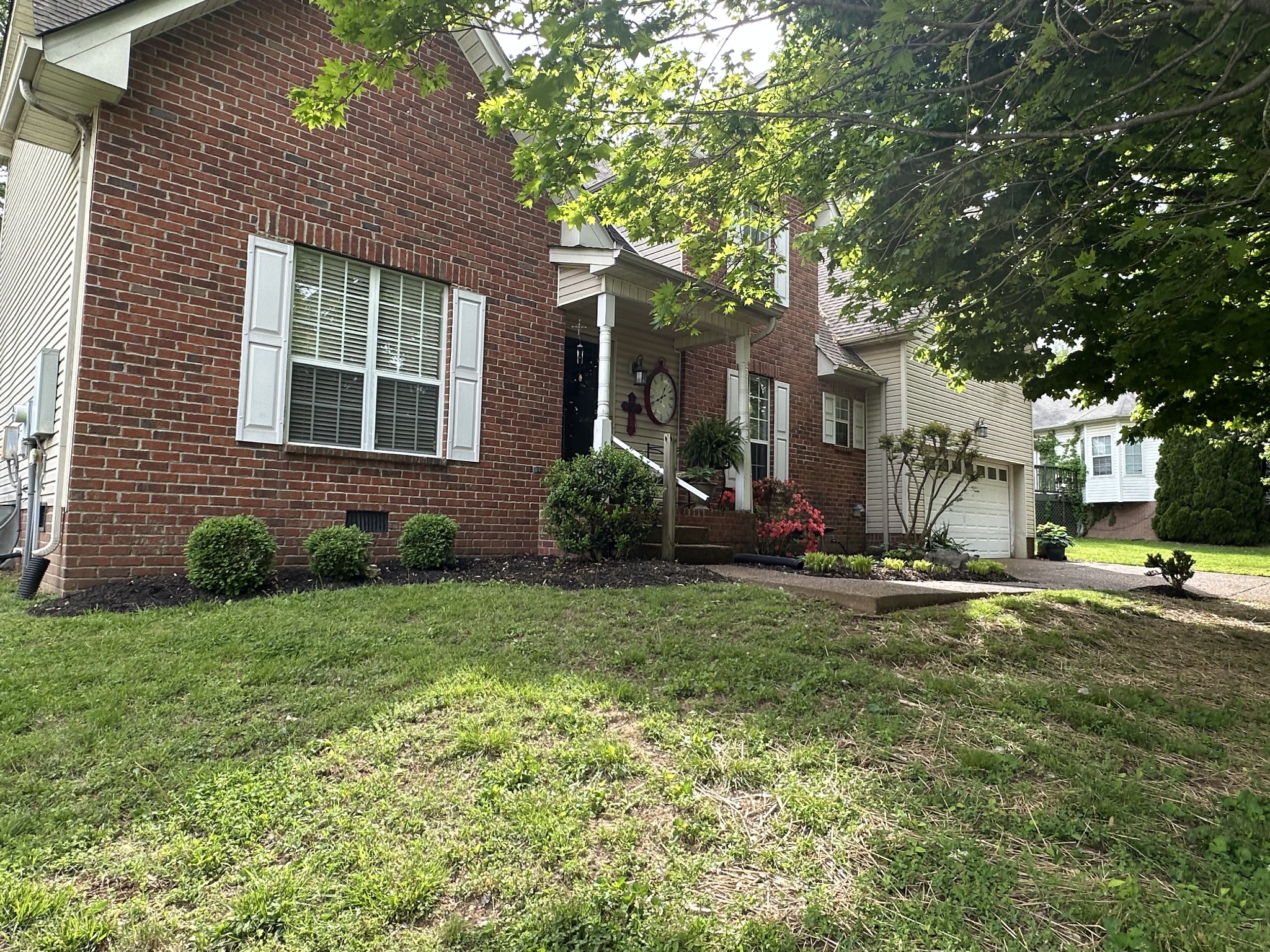 1817 Devon Drive Spring Hill, TN 37174 - Photo 2 of 28 a view of a house with a yard