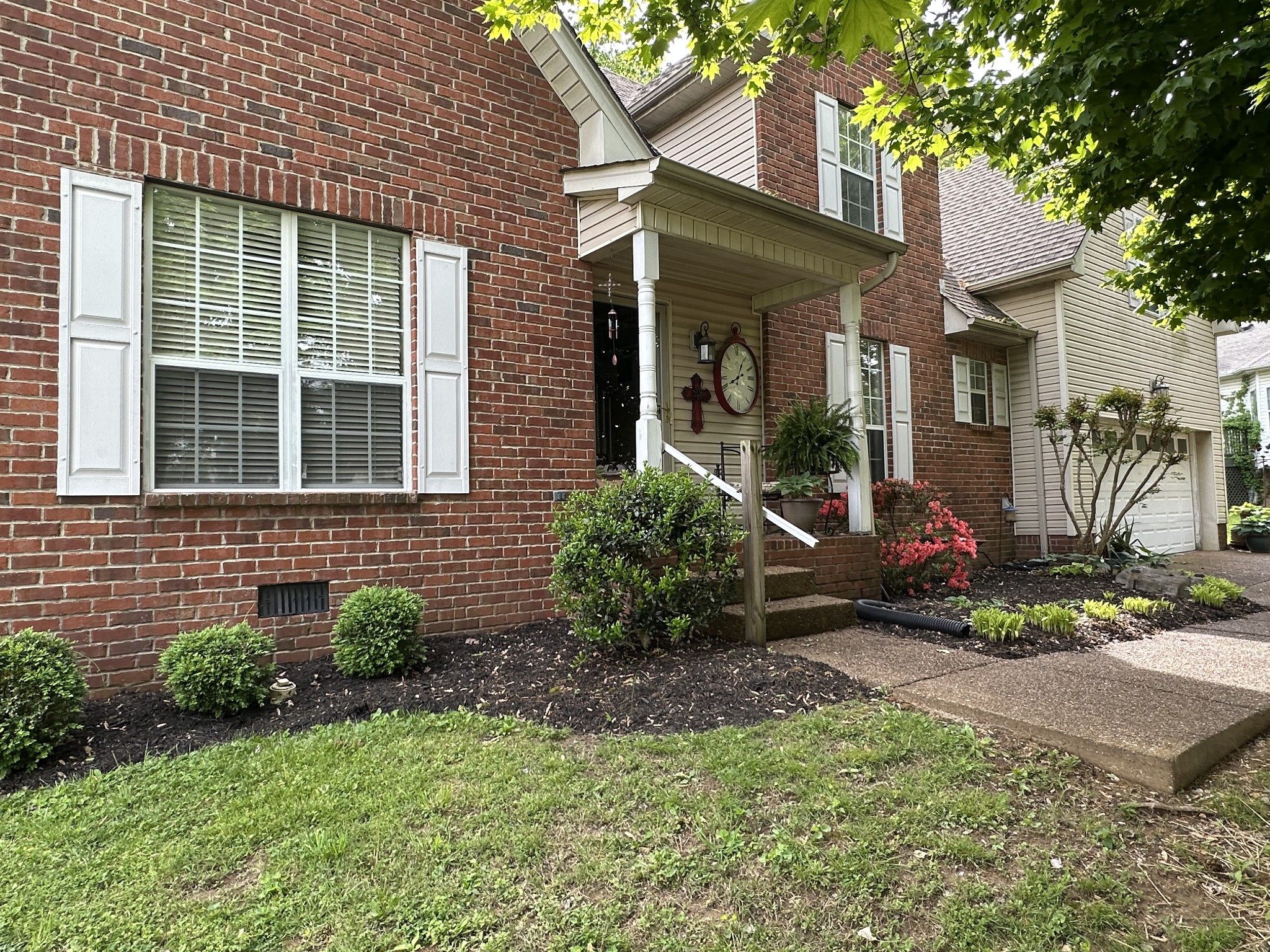 1817 Devon Drive Spring Hill, TN 37174 - Photo 23 of 28 a view of a house with a yard and sitting area