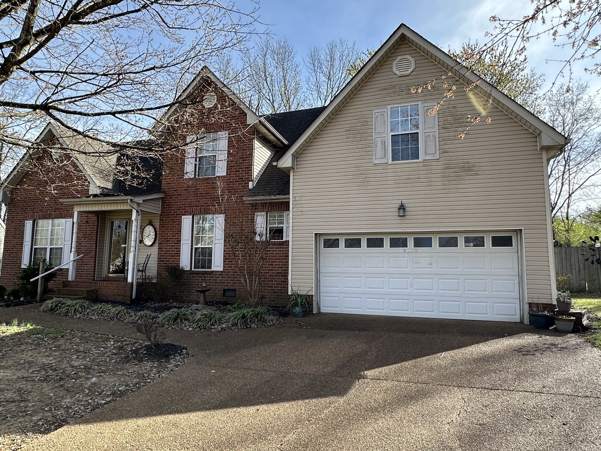 1817 Devon Drive Spring Hill, TN 37174 - Photo 26 of 28 a front view of a house with a yard
