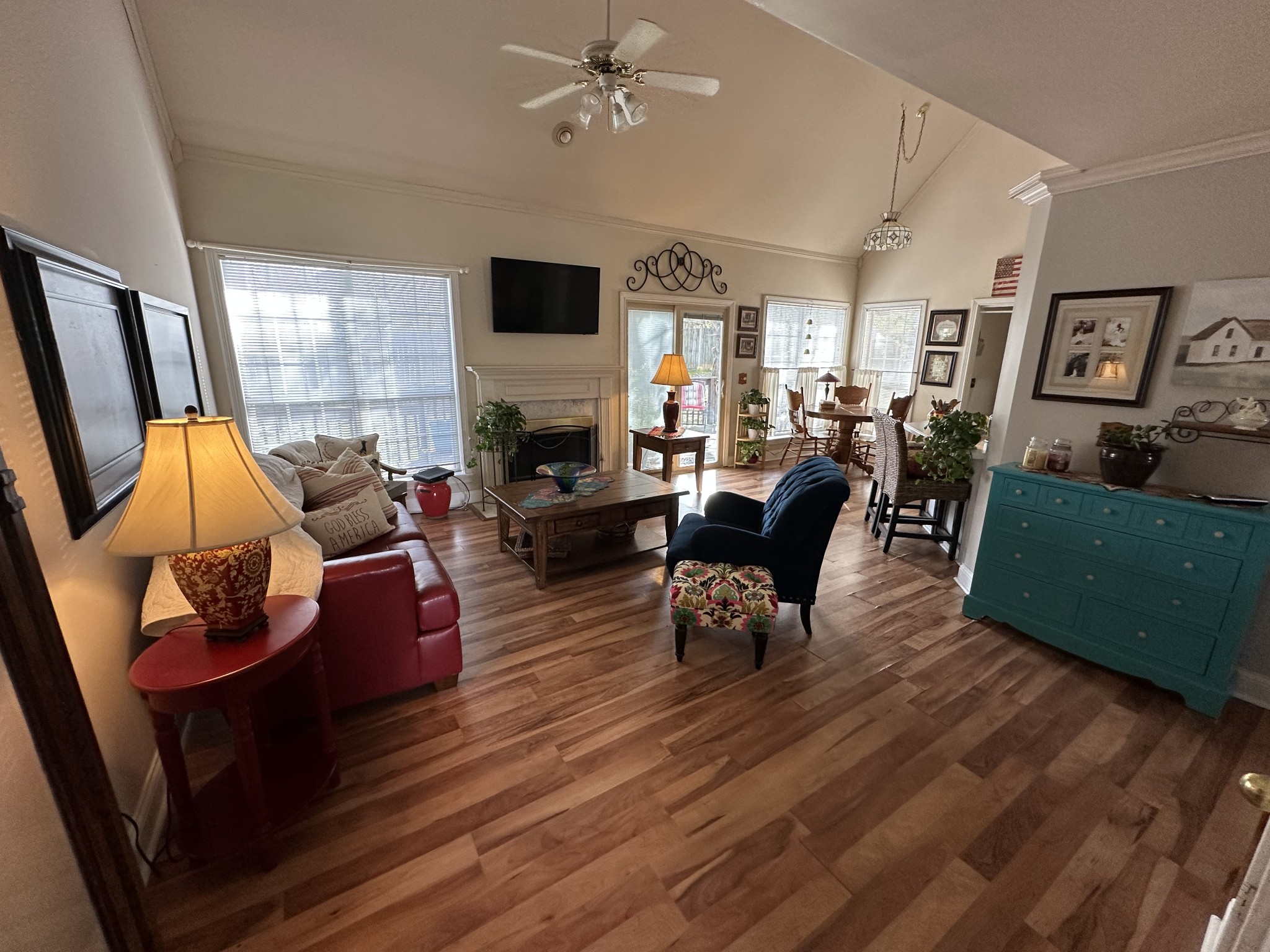1817 Devon Drive Spring Hill, TN 37174 - Photo 3 of 28 a living room with fireplace furniture and a flat screen tv