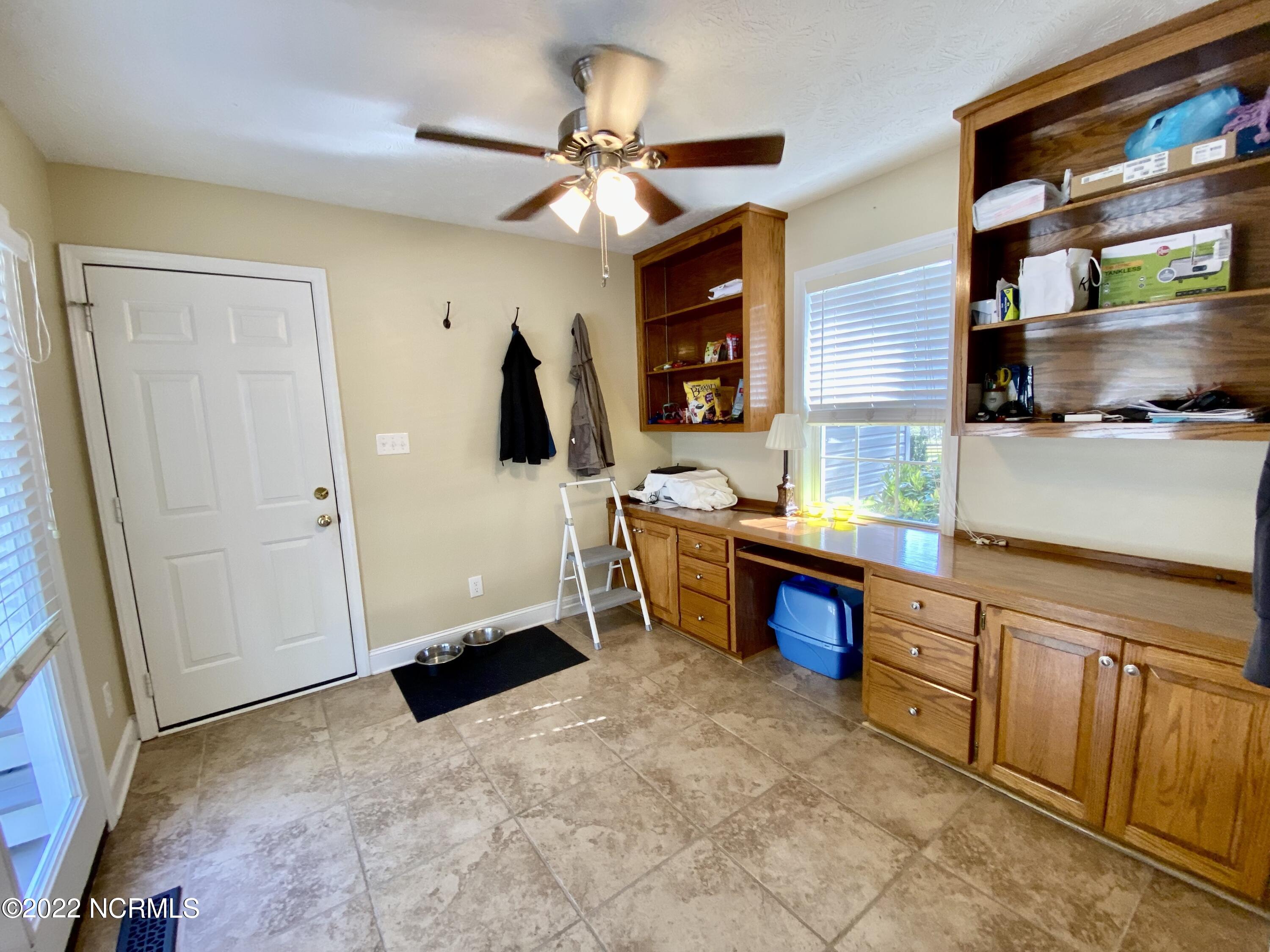 179 East V Hogan Drive Rockingham, NC 28379 - Photo 21 of 33 Den with garage access