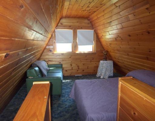 58 Benoak Road Wilton, ME 04294 - Photo 13 of 18 Bedroom. Loft area.