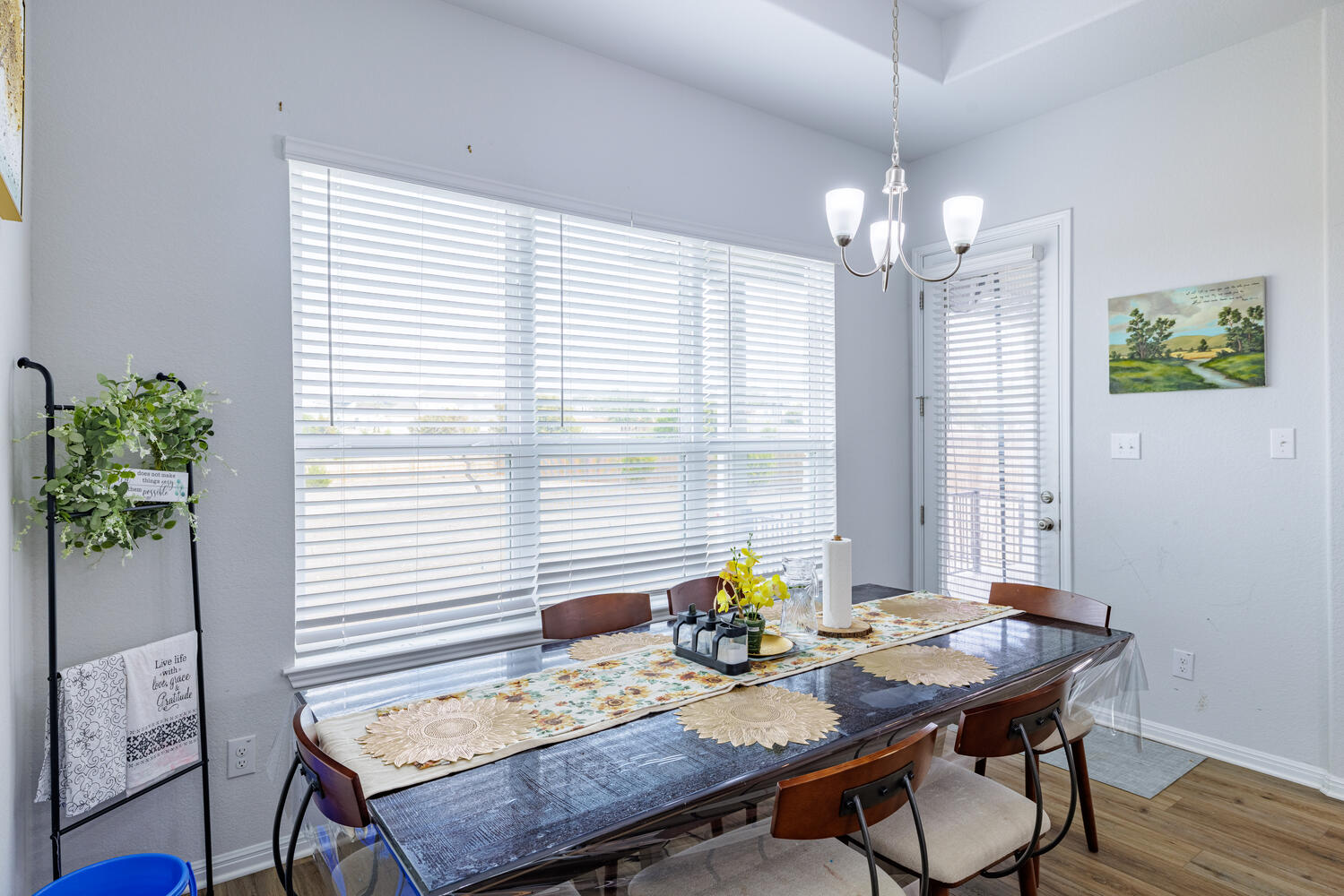 1913 Equine Road Leander, TX 78641 - Photo 15 of 35 a view of a dining room with furniture and wooden floor