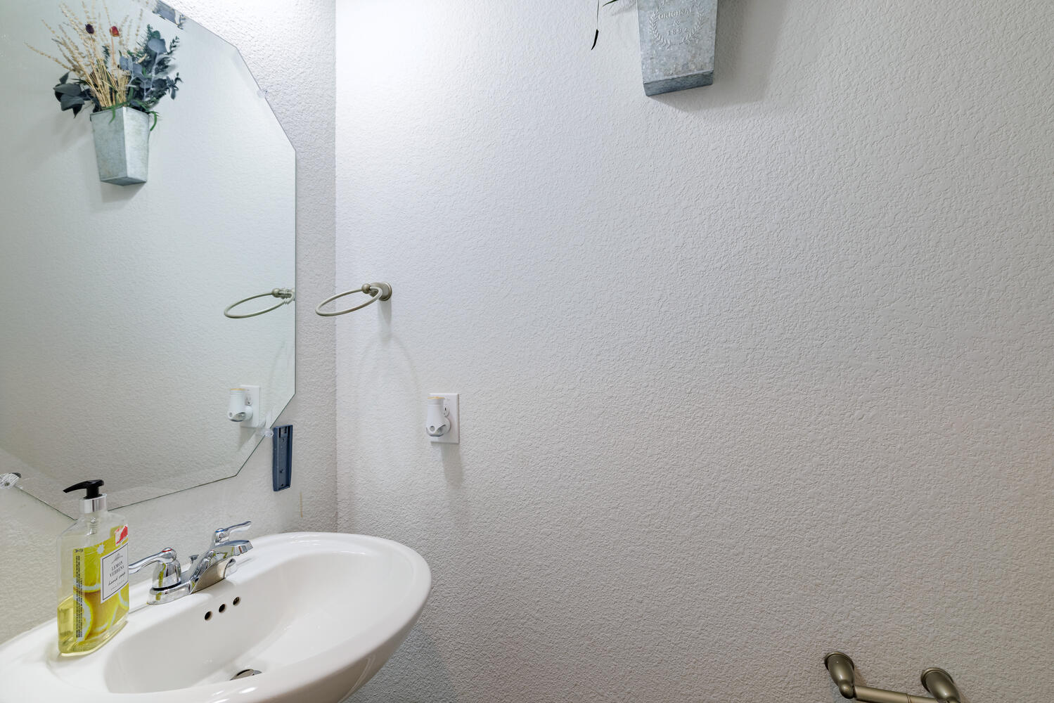 1913 Equine Road Leander, TX 78641 - Photo 26 of 35 a bathroom with a sink and a mirror