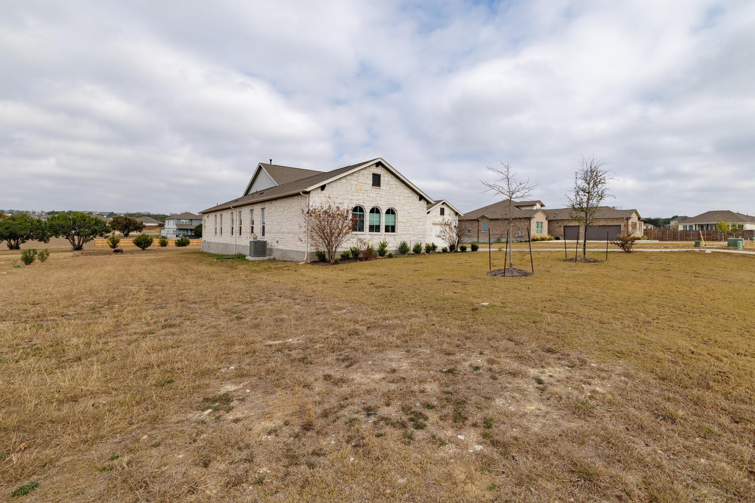 1913 Equine Road Leander, TX 78641 - Photo 3 of 35 a view of a lake with houses in the back