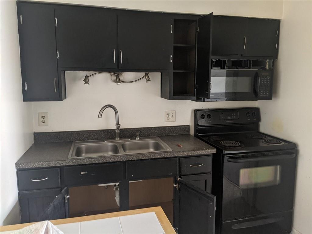530 Virginia Avenue Rochester, PA 15074 - Photo 15 of 22 a kitchen with a sink and cabinets