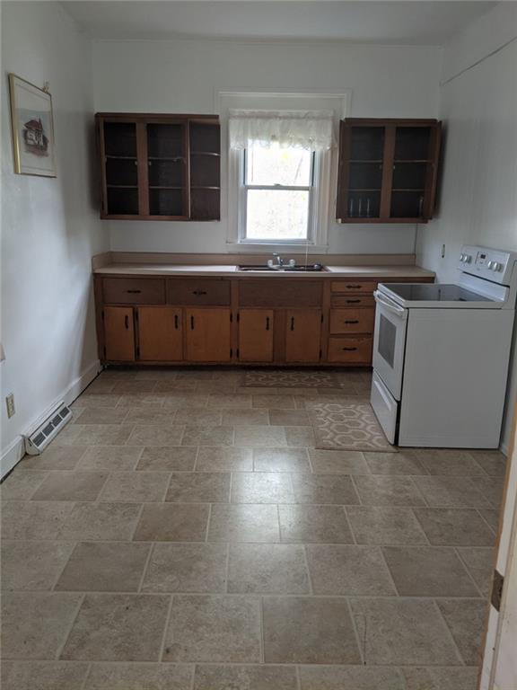 530 Virginia Avenue Rochester, PA 15074 - Photo 5 of 22 a living room with a sink and a stove top oven