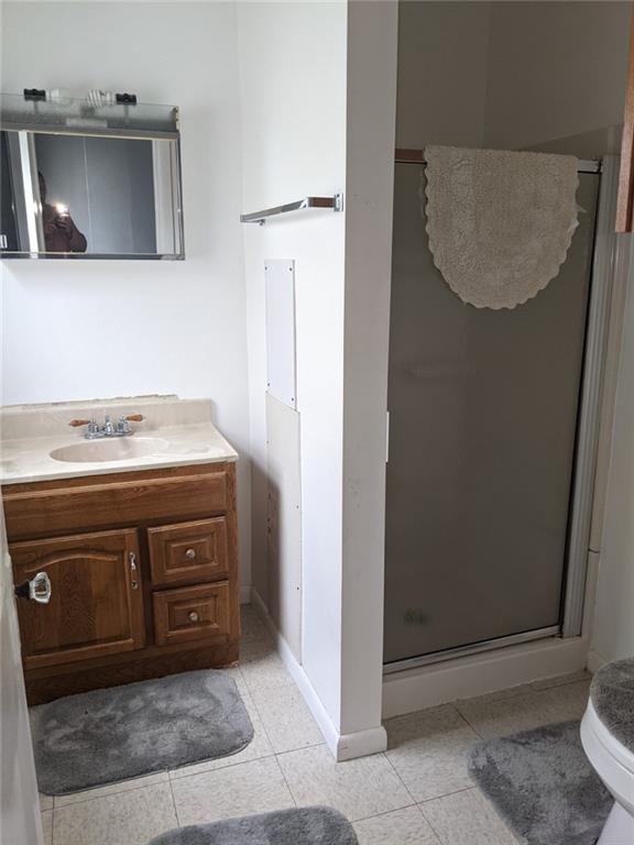 530 Virginia Avenue Rochester, PA 15074 - Photo 7 of 22 a bathroom with a sink and a mirror