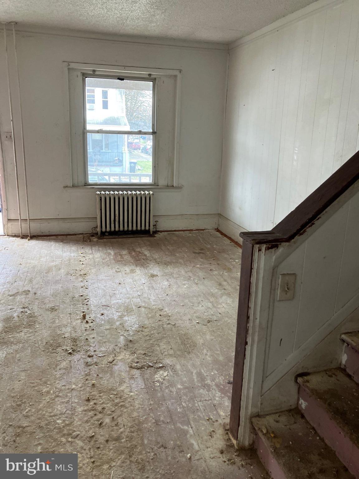 1233 Crosby Street Chester, PA 19013 - Photo 11 of 30 a view of an empty room with a window