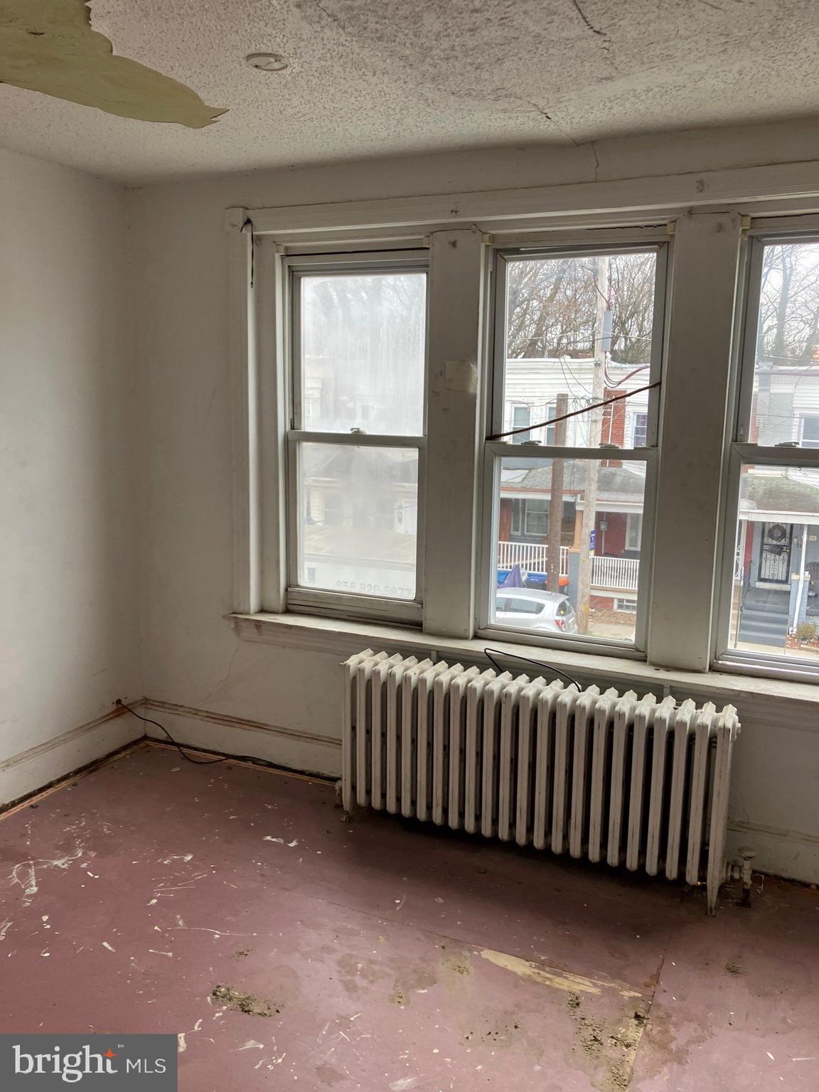 1233 Crosby Street Chester, PA 19013 - Photo 16 of 30 an empty room with a window