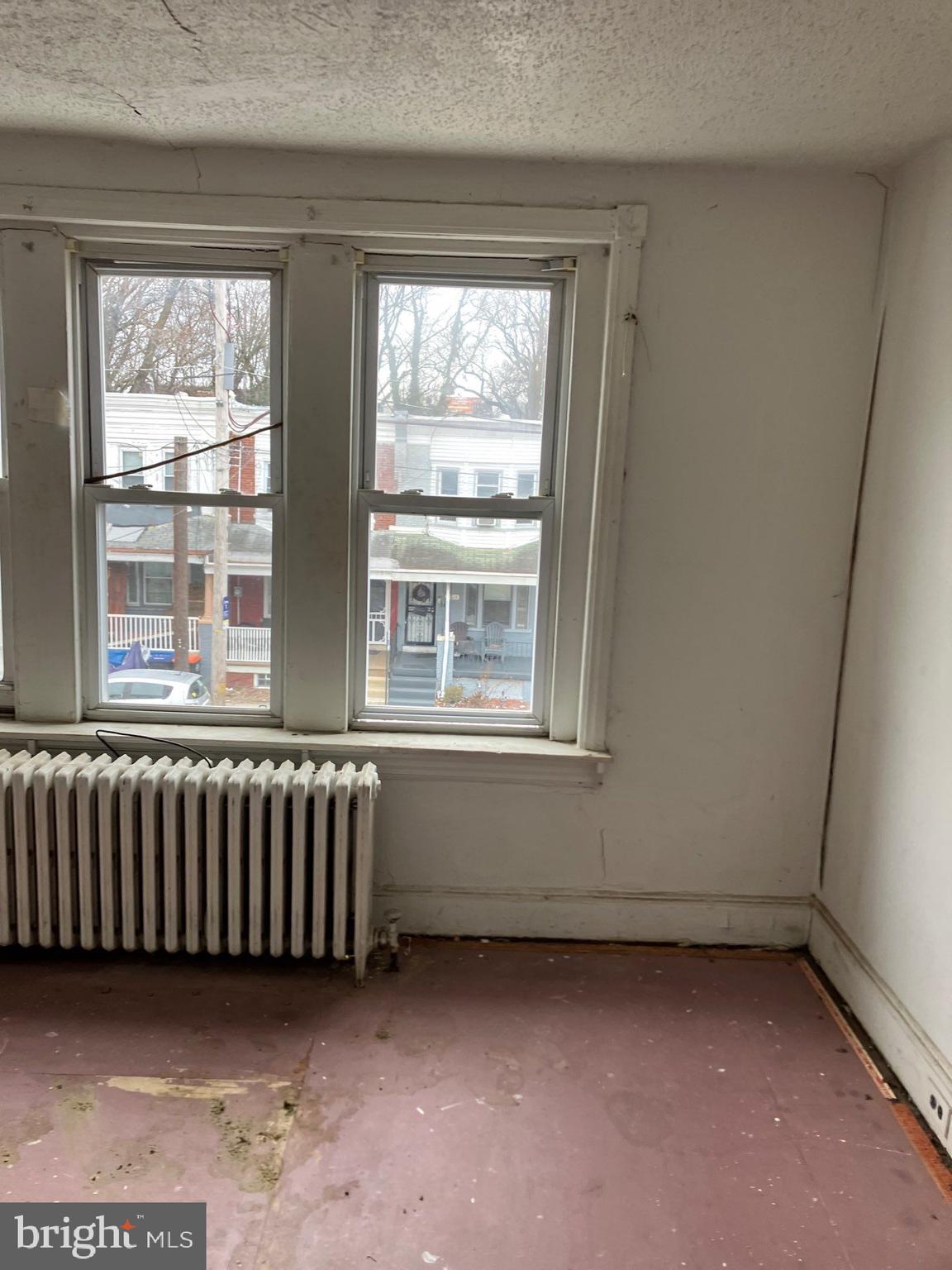 1233 Crosby Street Chester, PA 19013 - Photo 29 of 30 an empty room with a window