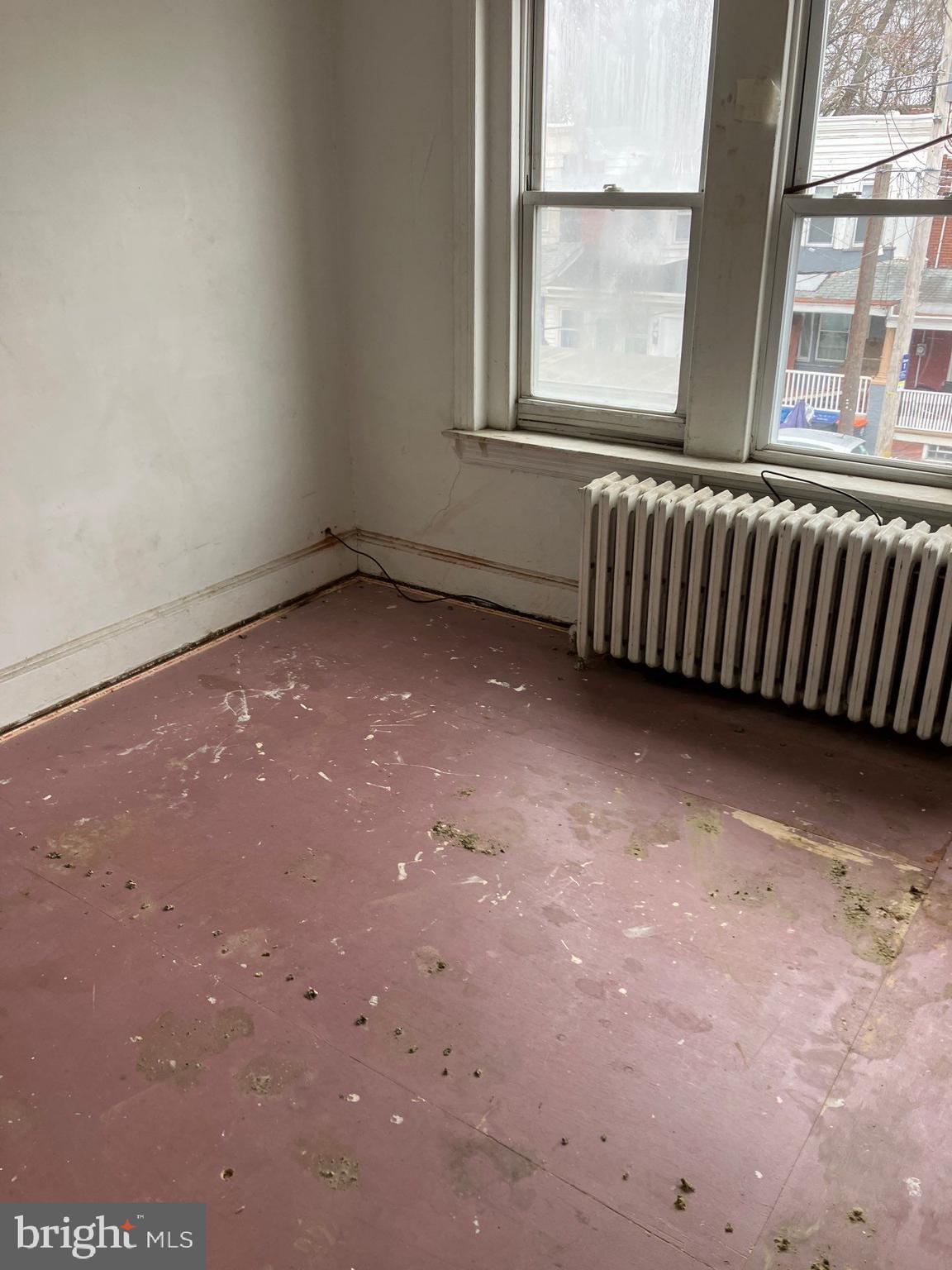 1233 Crosby Street Chester, PA 19013 - Photo 30 of 30 an empty room with windows