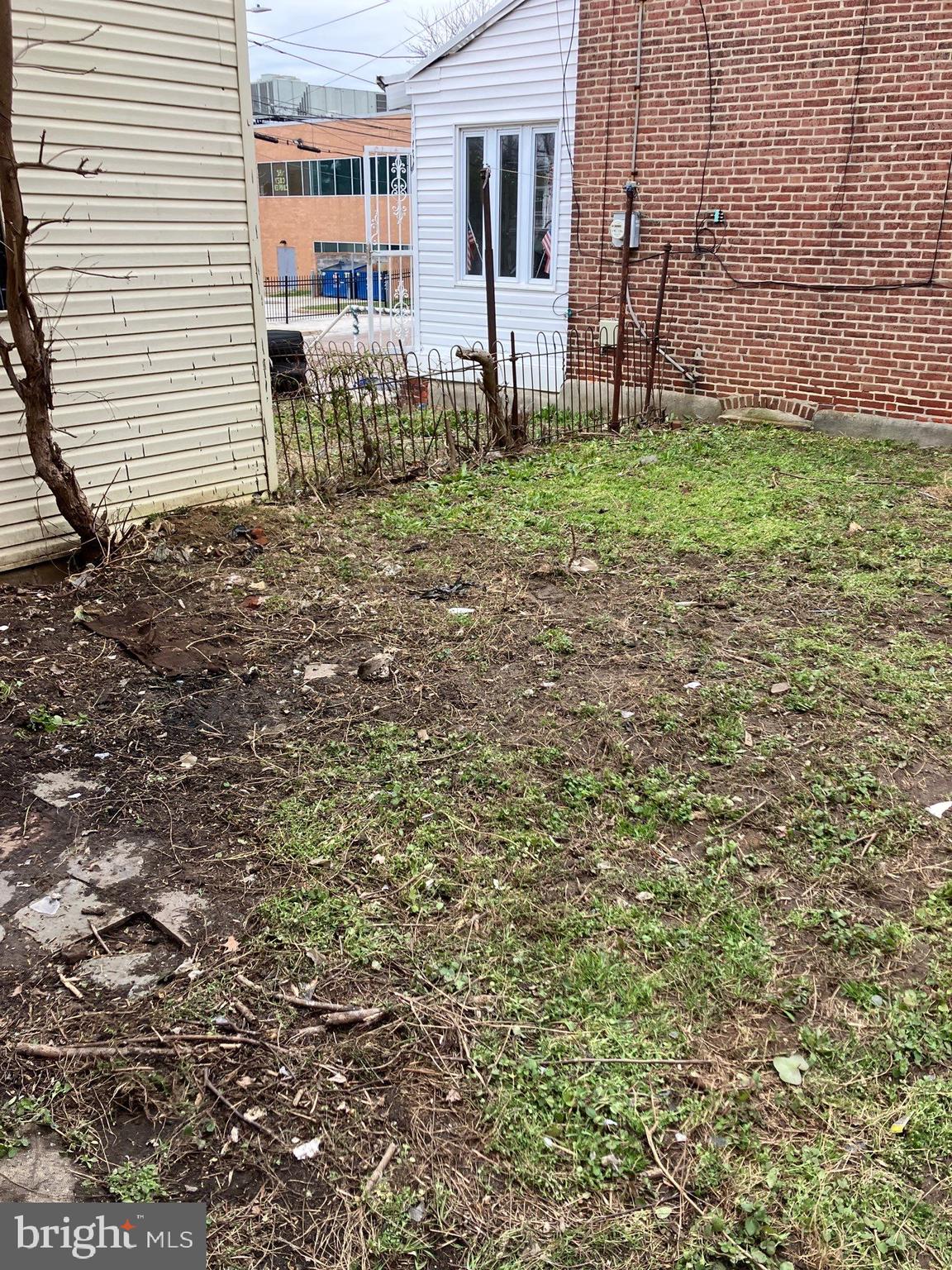 1233 Crosby Street Chester, PA 19013 - Photo 5 of 30 a backyard of a house with lots of green space