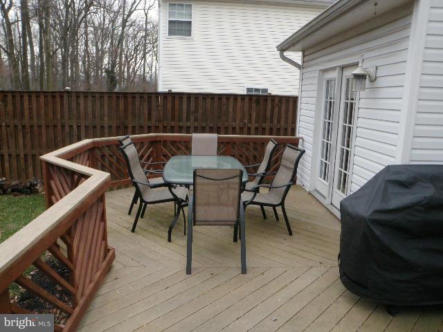 515 Tulip Road Riva, MD 21140 - Photo 16 of 30 a view of balcony with wooden floor and outdoor seating