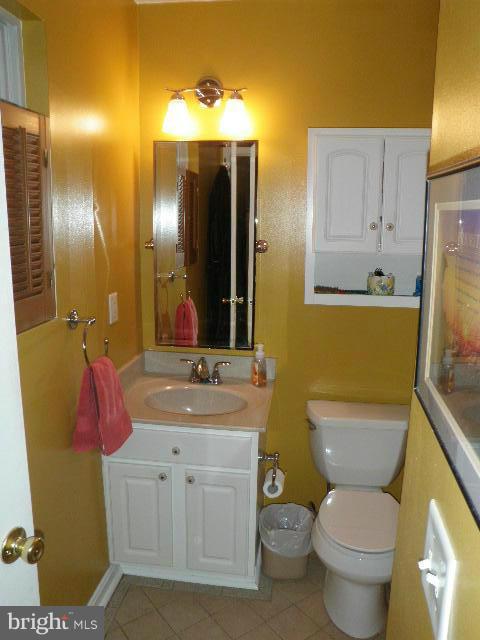 515 Tulip Road Riva, MD 21140 - Photo 17 of 30 a bathroom with a sink vanity mirror and toilet